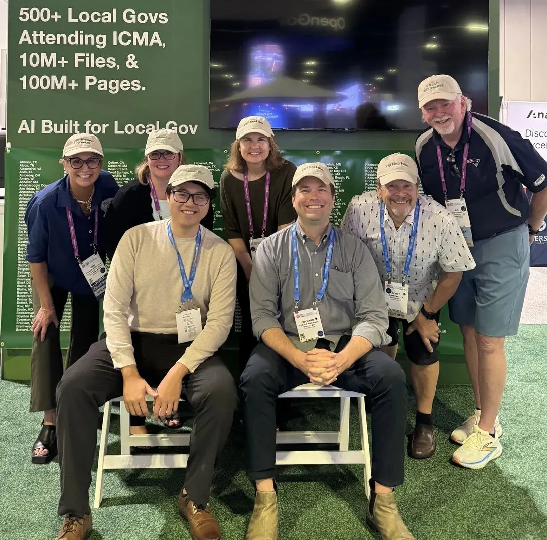 The Prophecy Gov team and ICMA ambassadors in front of the Prophecy booth at ICMA 2025